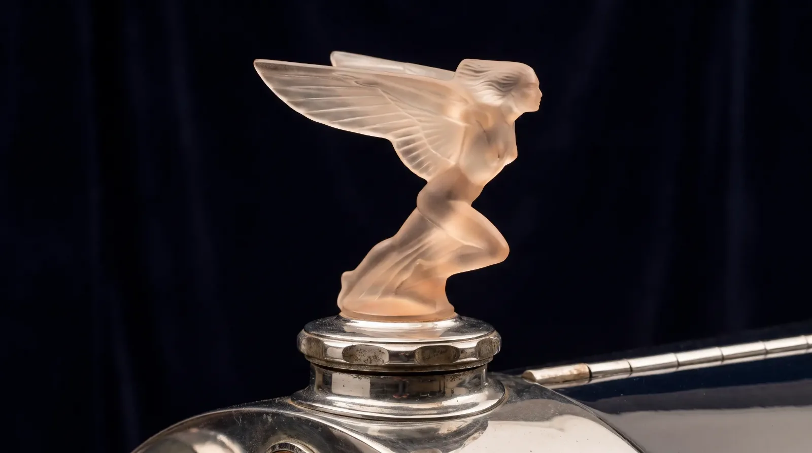 1920s Lalique glass mascot glowing on radiator cap