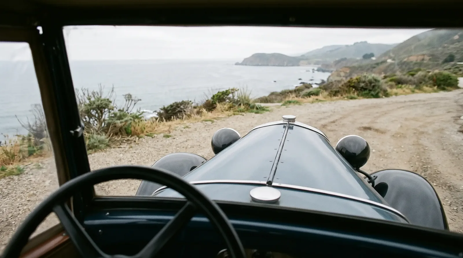 1930 Ford Model A roadster, view over the cowl and hood to the coast
