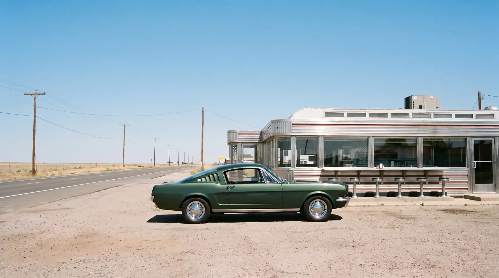 1965 Ford Mustang 2+2 fastback, profile outside a roadside diner