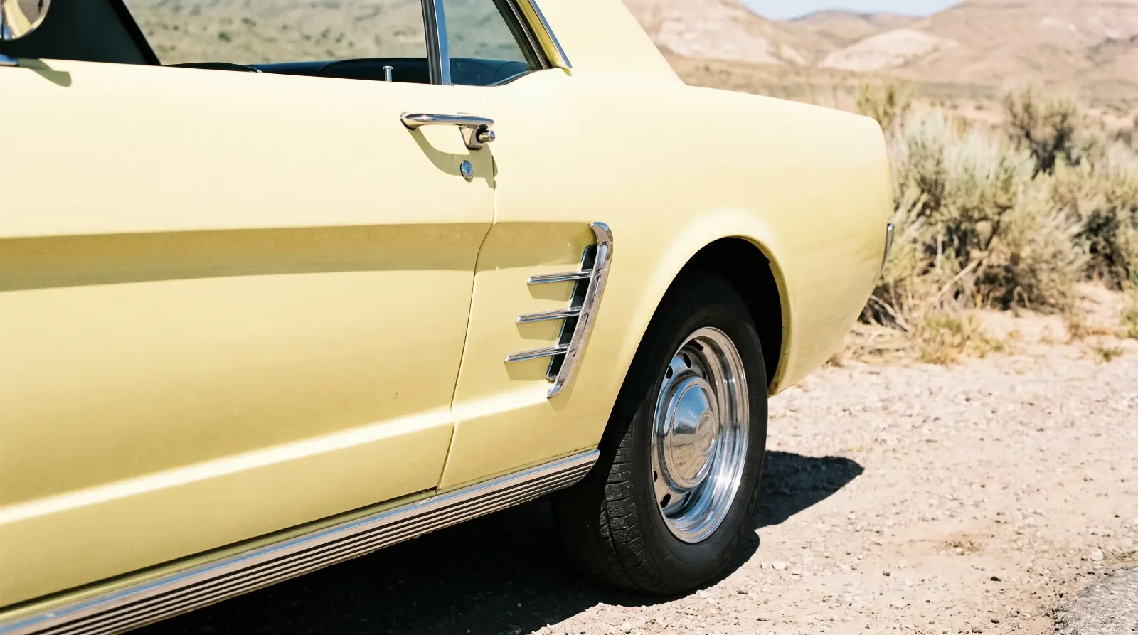 1966 Ford Mustang hardtop, three-bar chrome ornament on the rear quarter scoop