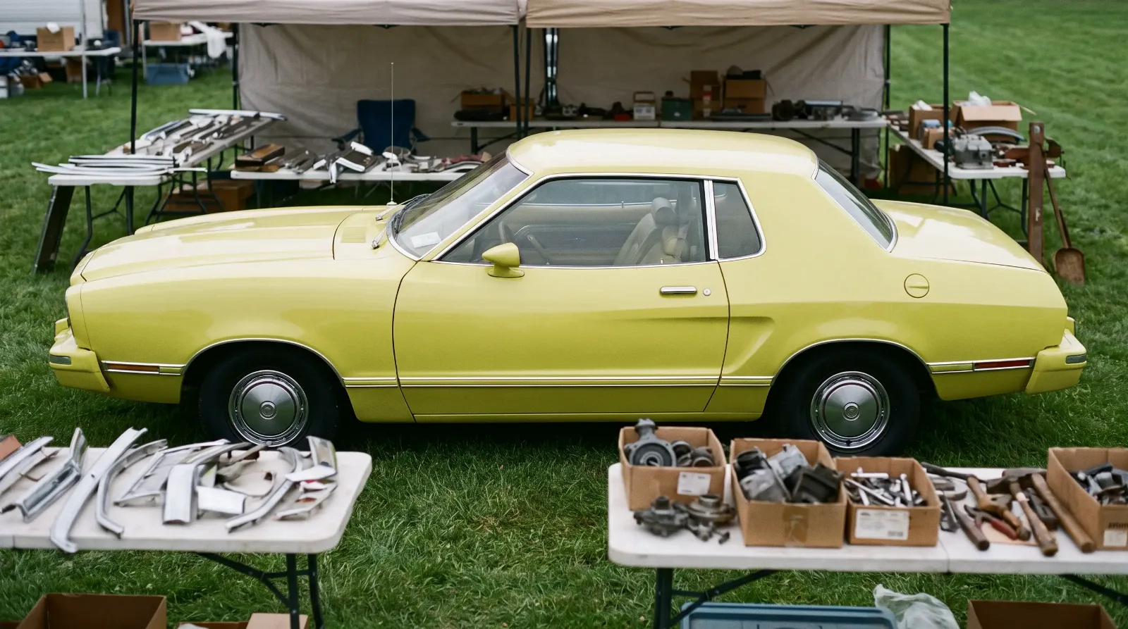 1974 Ford Mustang II Hardtop, in profile at a swap meet