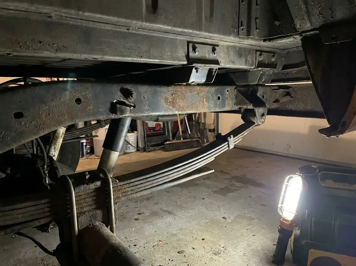 1970s Chevrolet C10 rear leaf spring detail -- camper package suspension upgrade