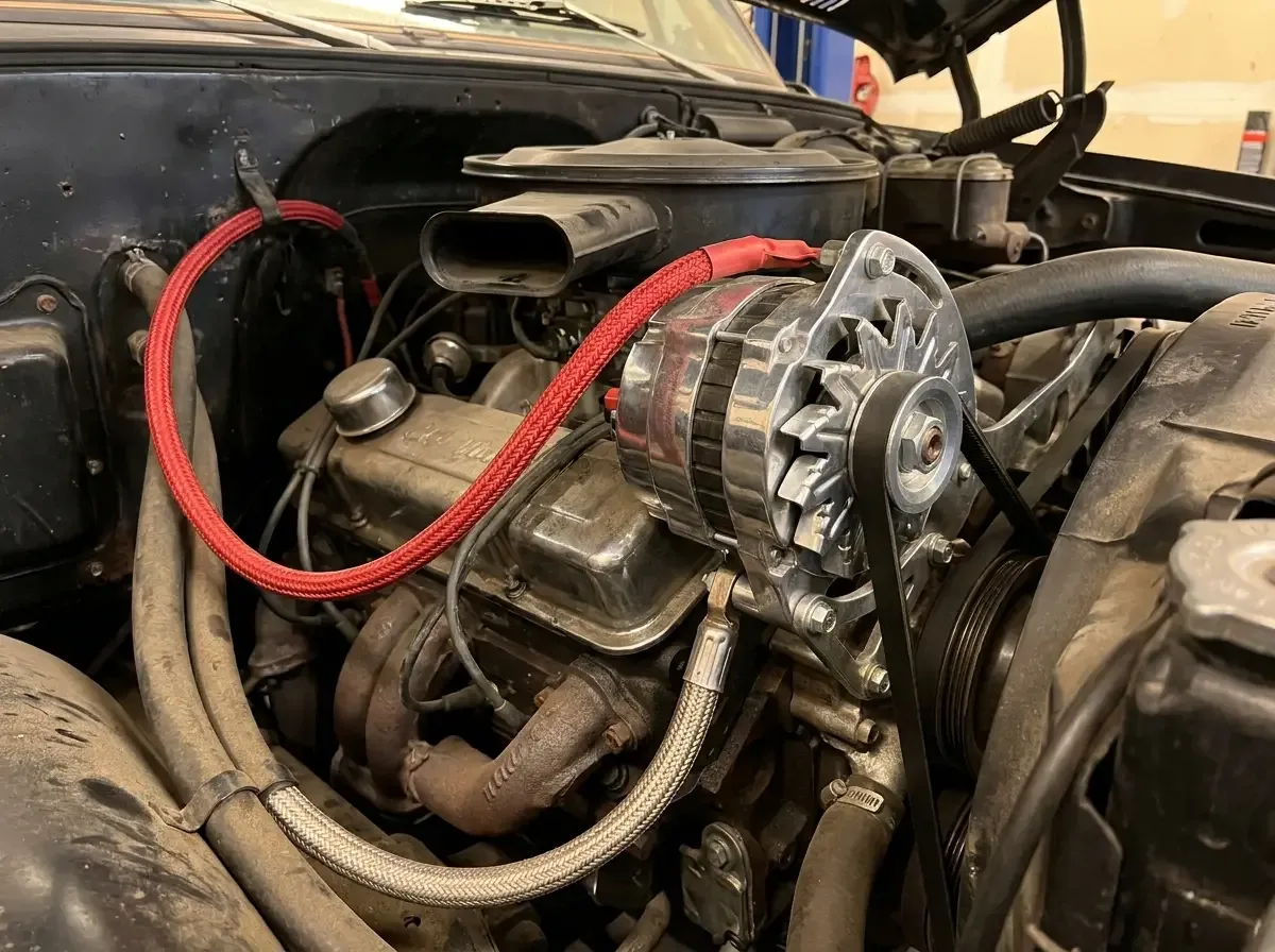 High-output alternator and charge wire on a C10 engine