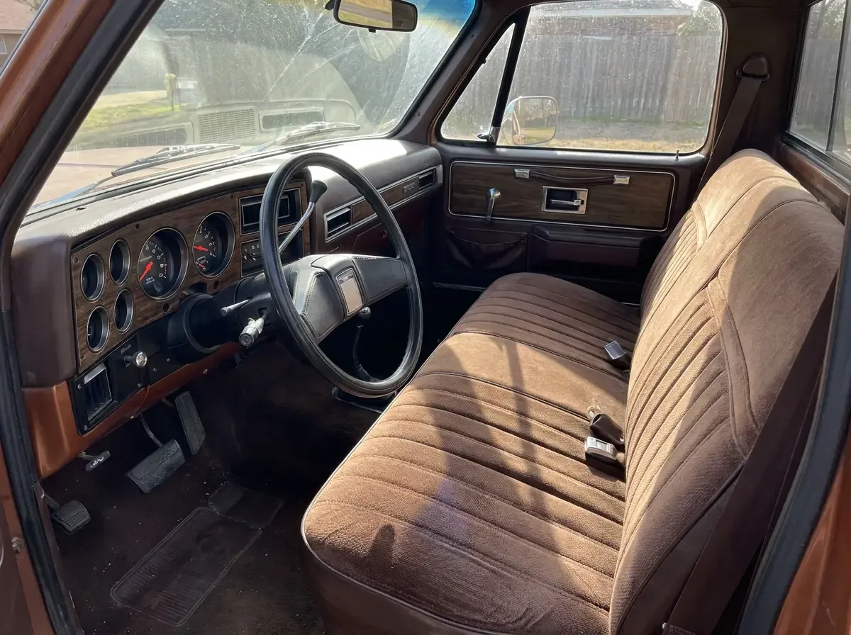 1978 Chevrolet C10 Cheyenne -- woodgrain dash cockpit interior