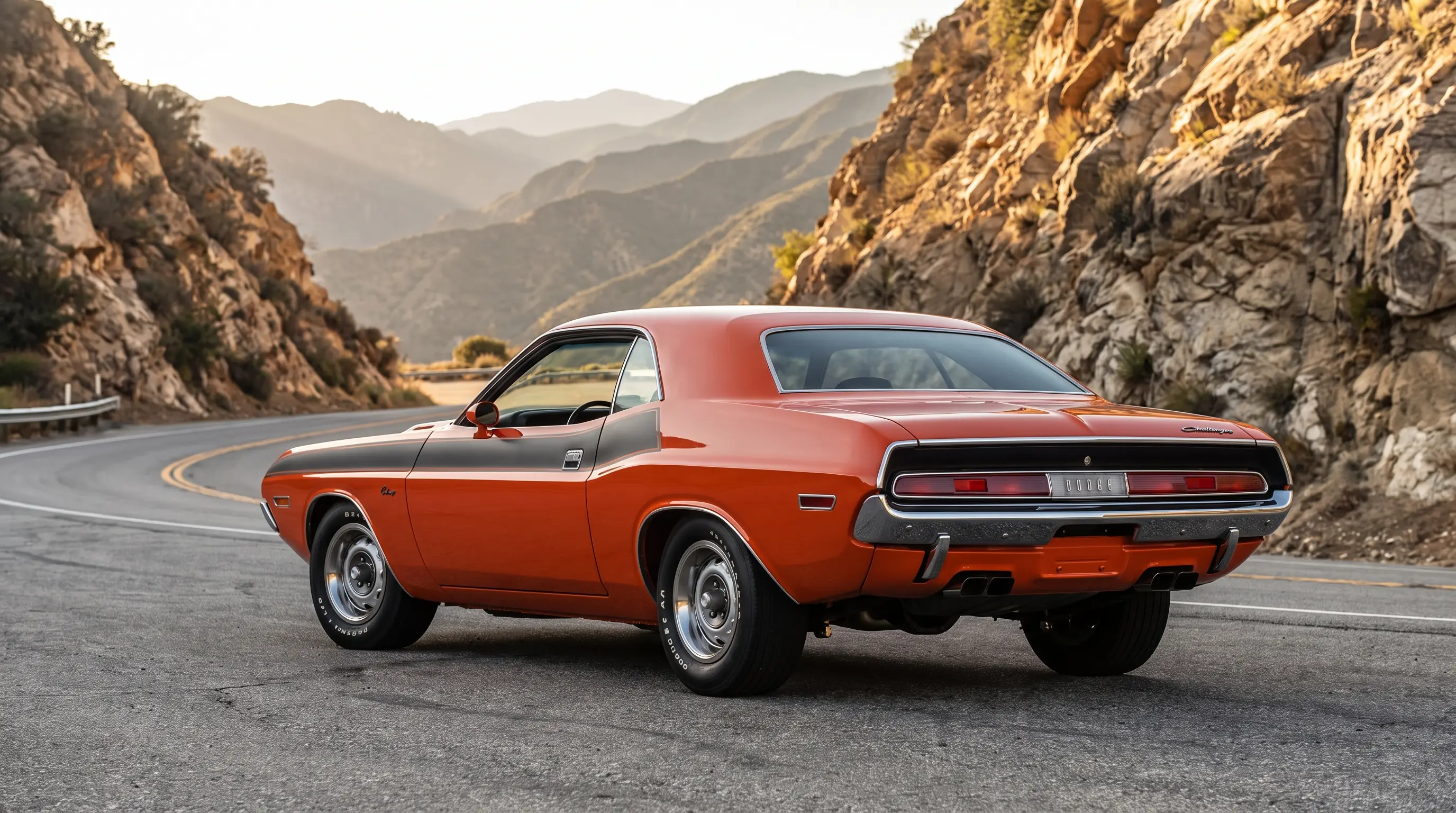 Orange 1972 Dodge Challenger Rallye with black stripe on a mountain canyon road