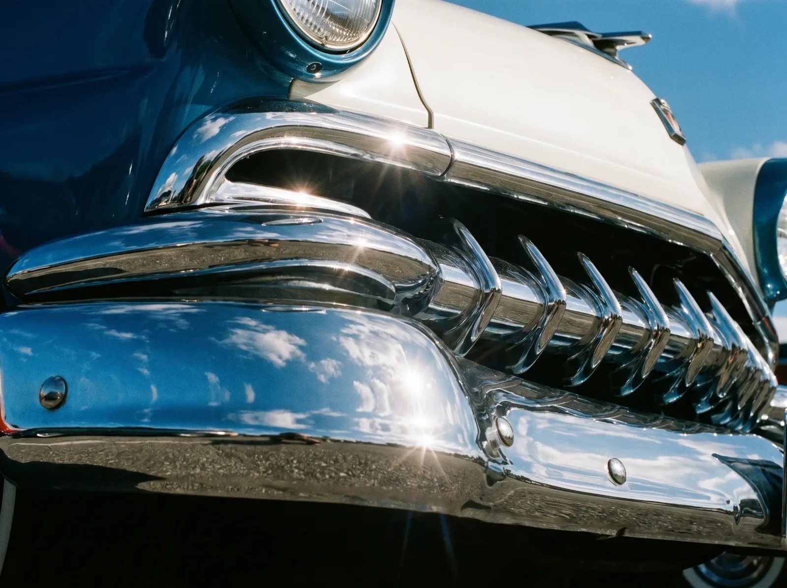 Chrome brightwork detail on a 1950s luxury car