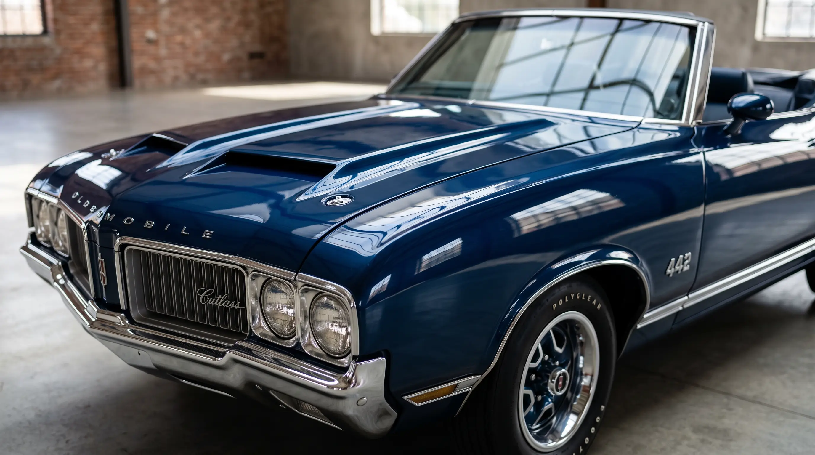 Close up glossy fender and hood of a vivid factory paint A-body Cutlass