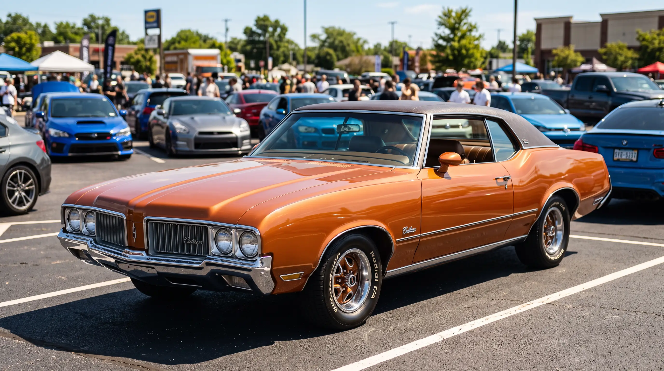 Copper metallic Oldsmobile Cutlass Supreme at a sunny modern car meet