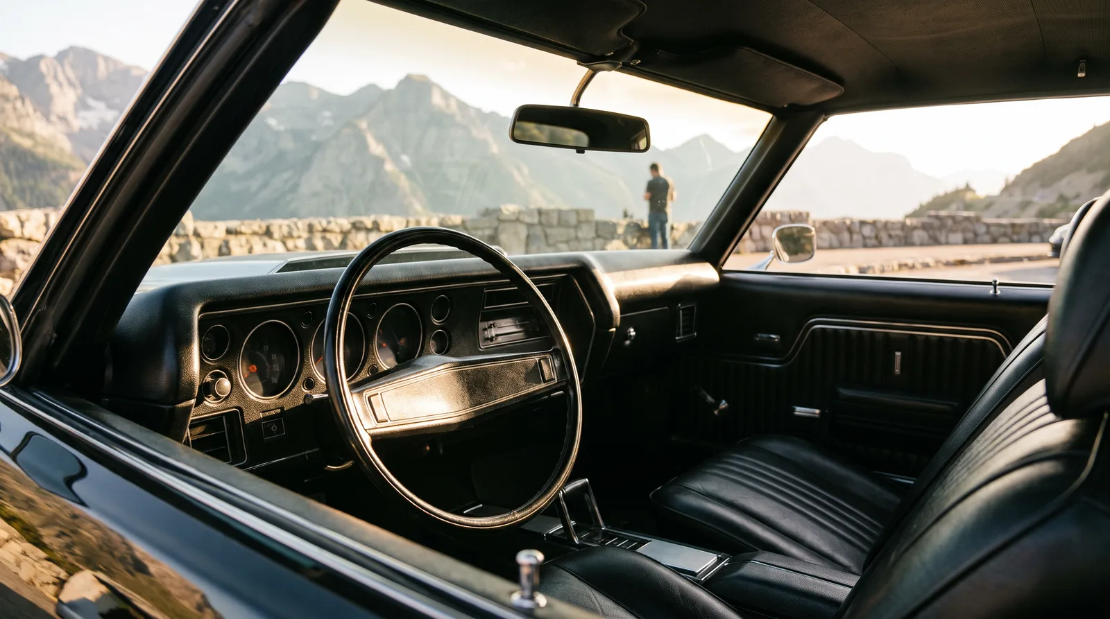 1970 Chevrolet Chevelle â€” freshly dyed black vinyl interior at a mountain pull-out