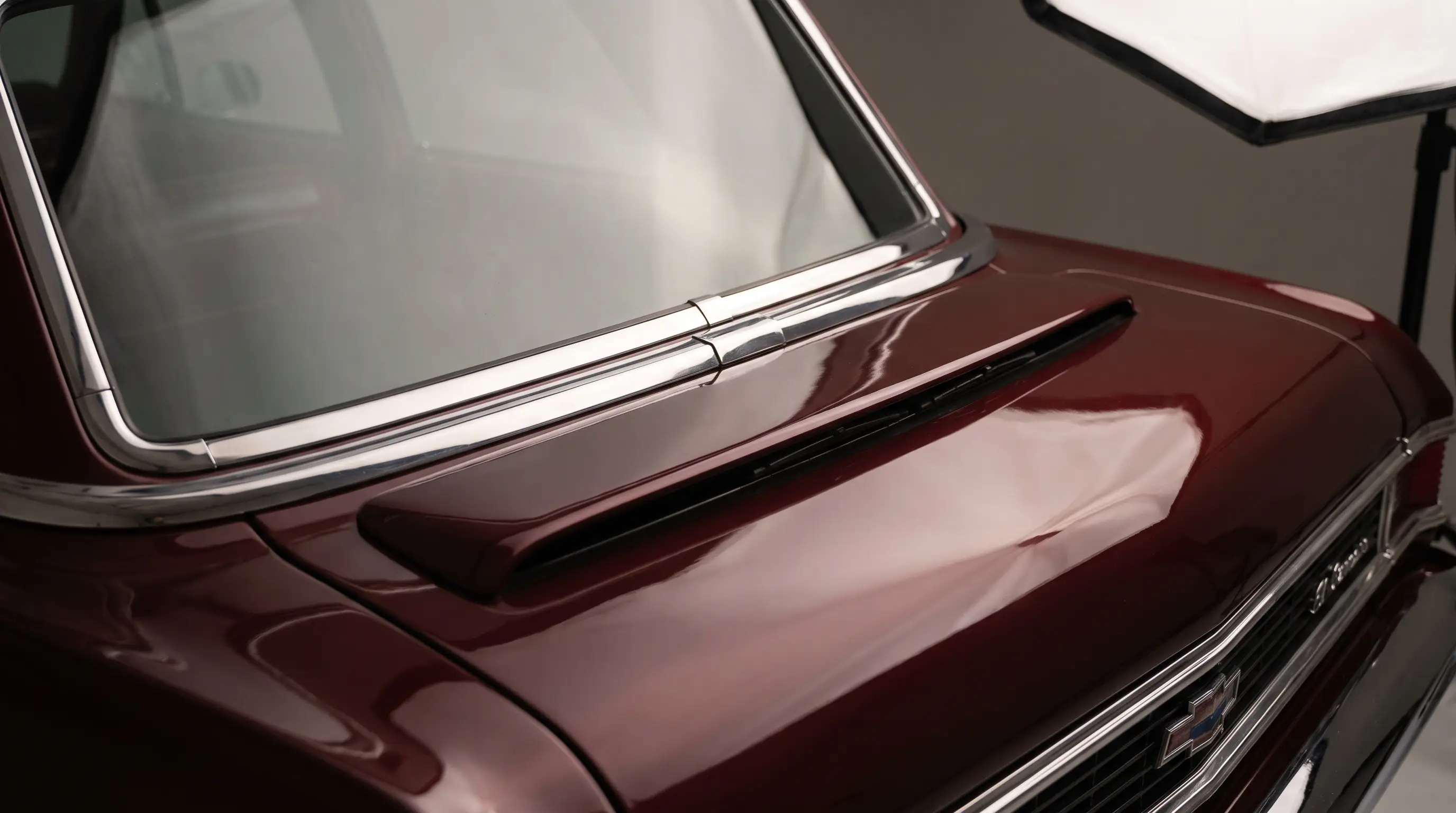 Close up of hidden wiper and chrome trim details on a 1968 El Camino front end