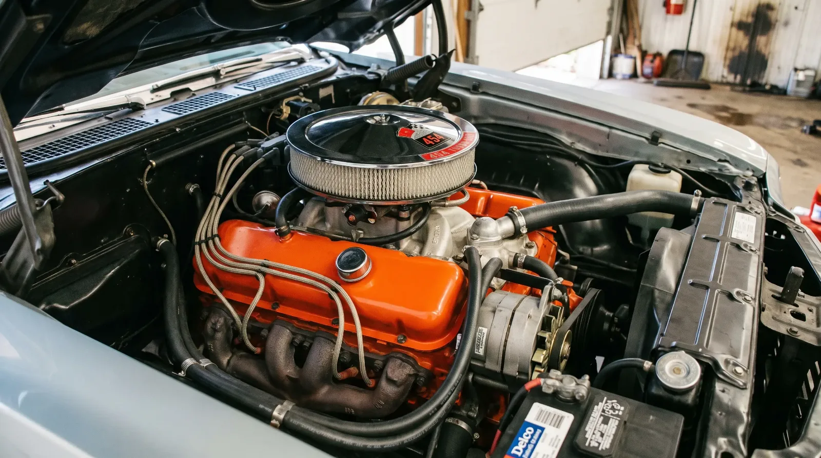 Open engine bay of a 1970 Chevrolet Chevelle big-block 454 V8 with chrome air cleaner