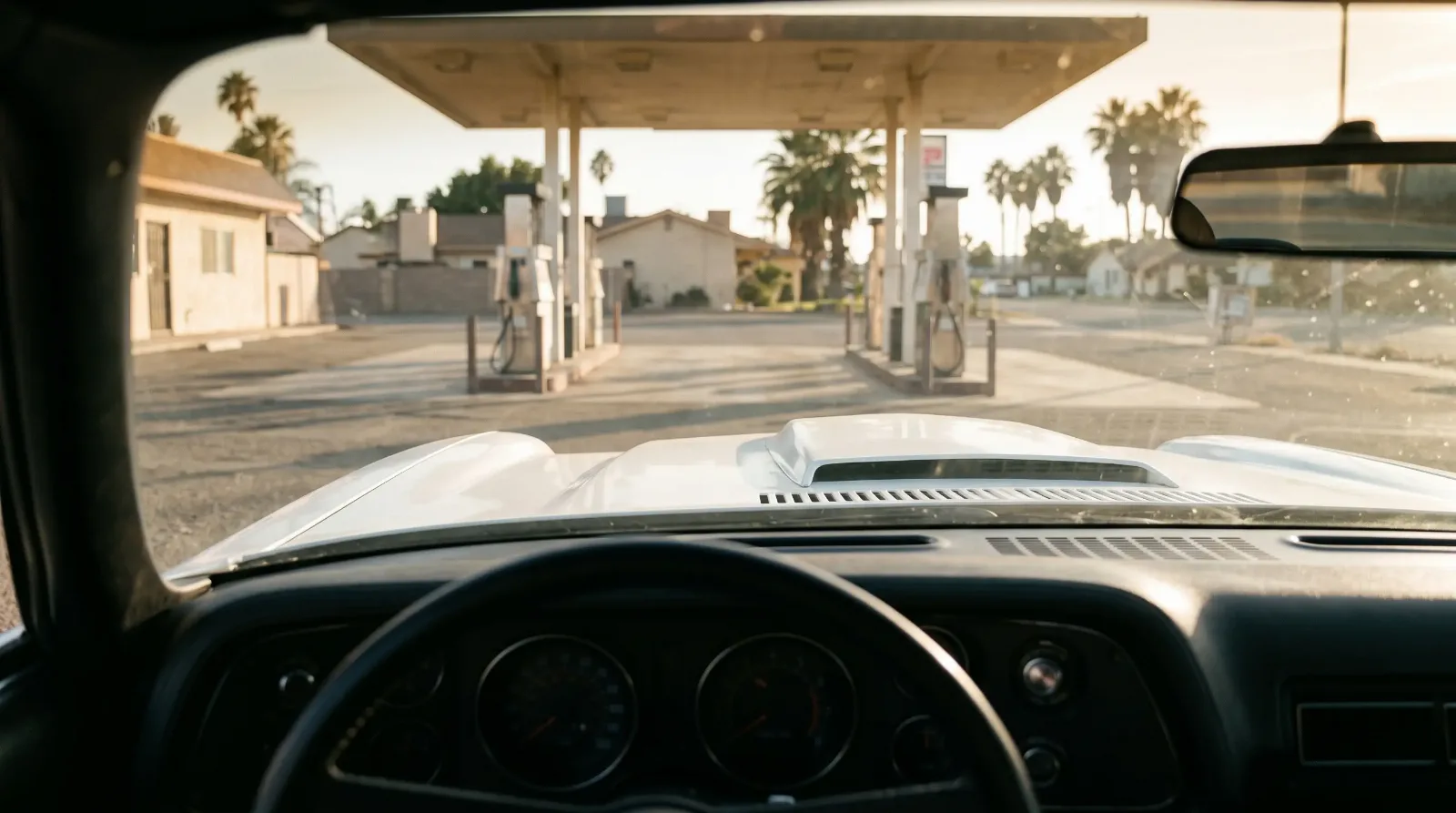 1979 Chevrolet Camaro Z28, gas station pumps at golden hour