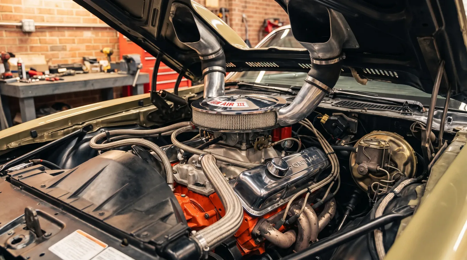 Pontiac 400 V8 engine bay of a 1970 Firebird Formula 400 with twin-scoop hood open
