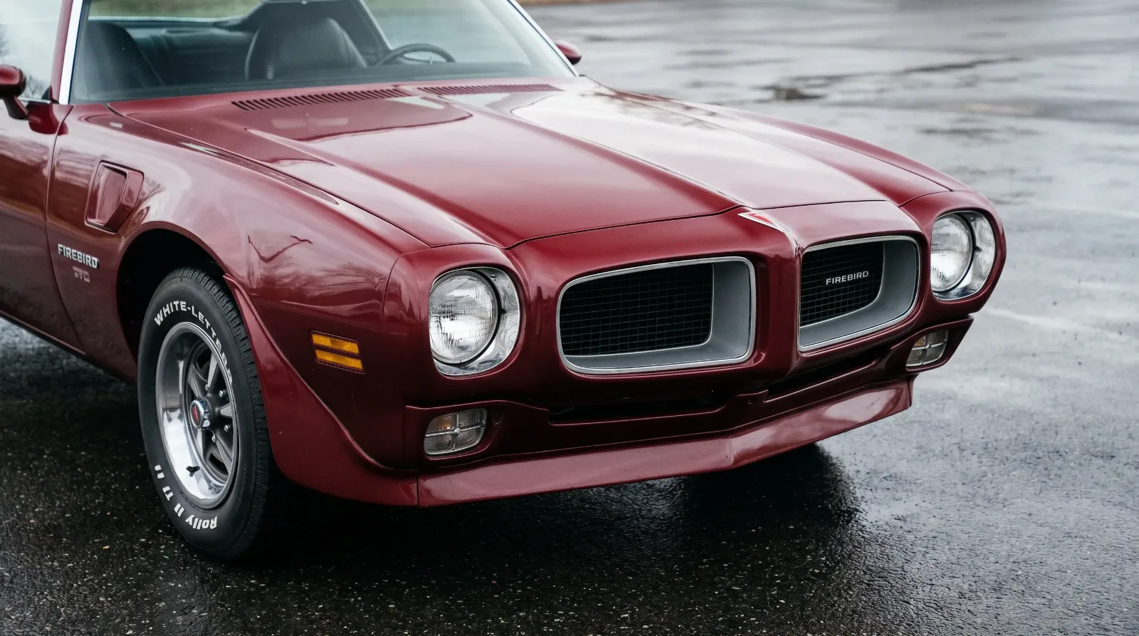Close-up of a 1970 Pontiac Firebird's pointed Endura nose showing its twin split grille openings