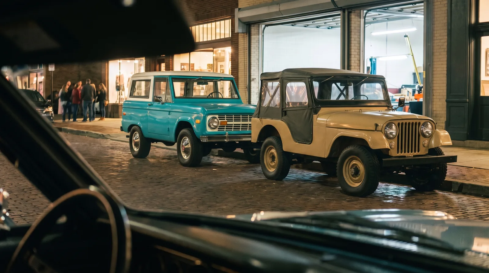 1966 Ford Bronco and Jeep CJ-5, side by side on a city street