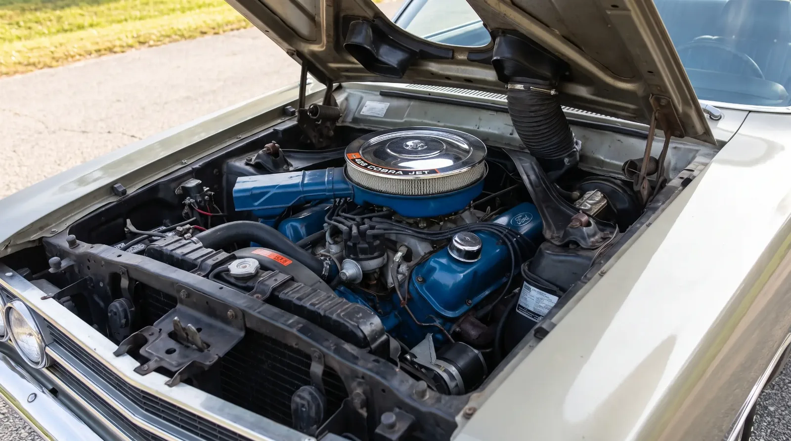 Ford FE 428 Cobra Jet big-block engine bay in a 1969 Torino with the hood open