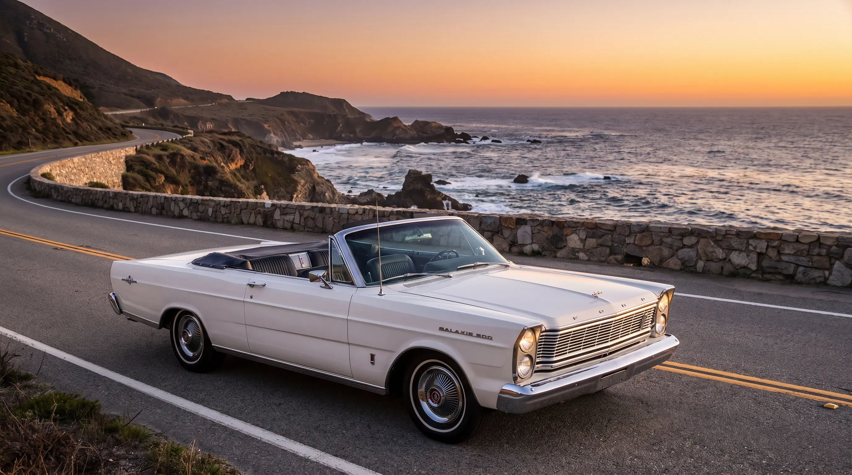 White 1965 Ford Galaxie Sunliner convertible parked on a coastal overlook