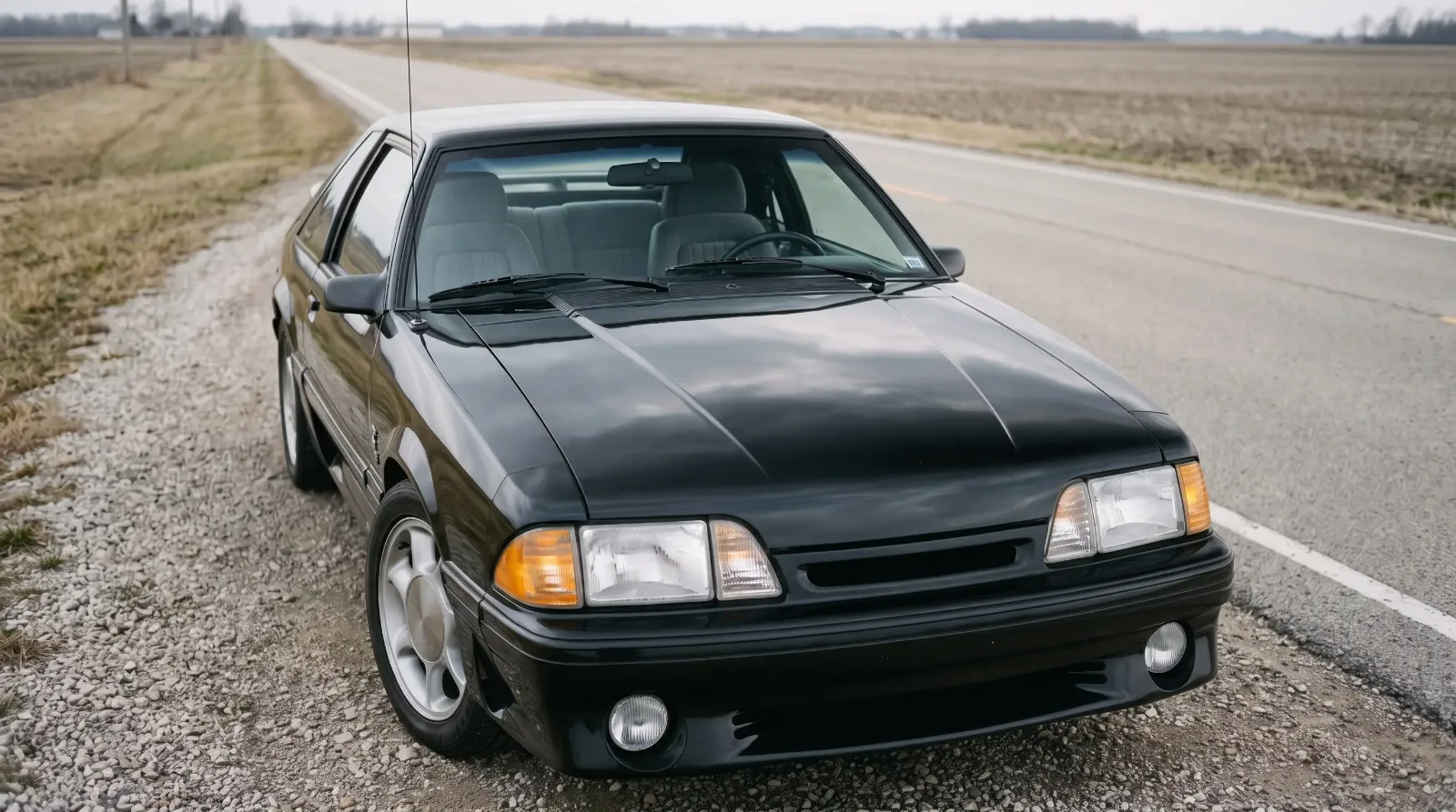 1993 Ford Mustang SVT Cobra, parked on an empty country road