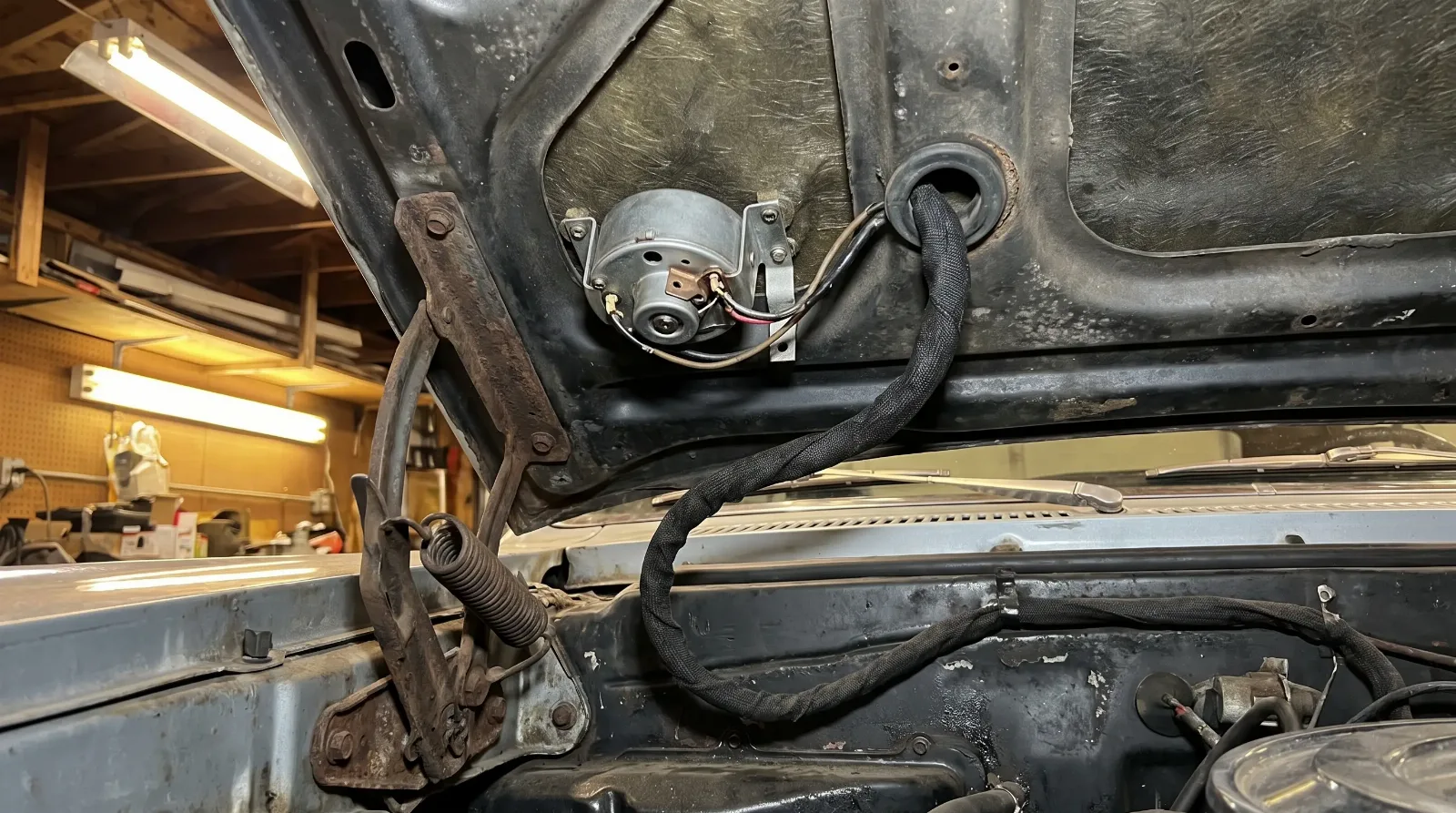 Hood tach mechanism and wiring during restoration