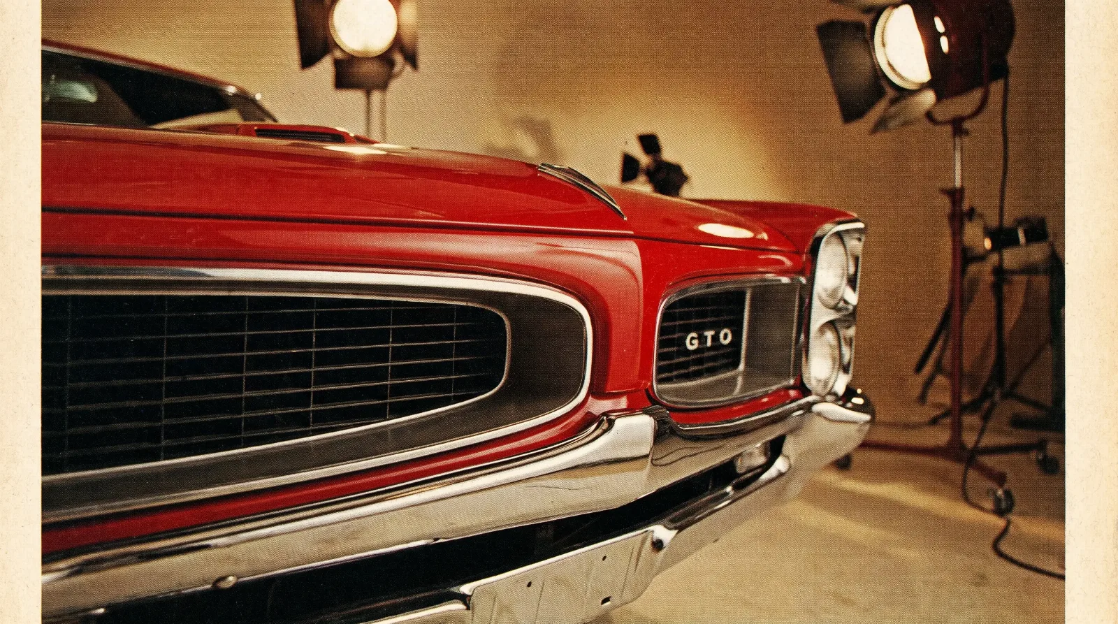1967 Pontiac GTO red coupe studio ad shot