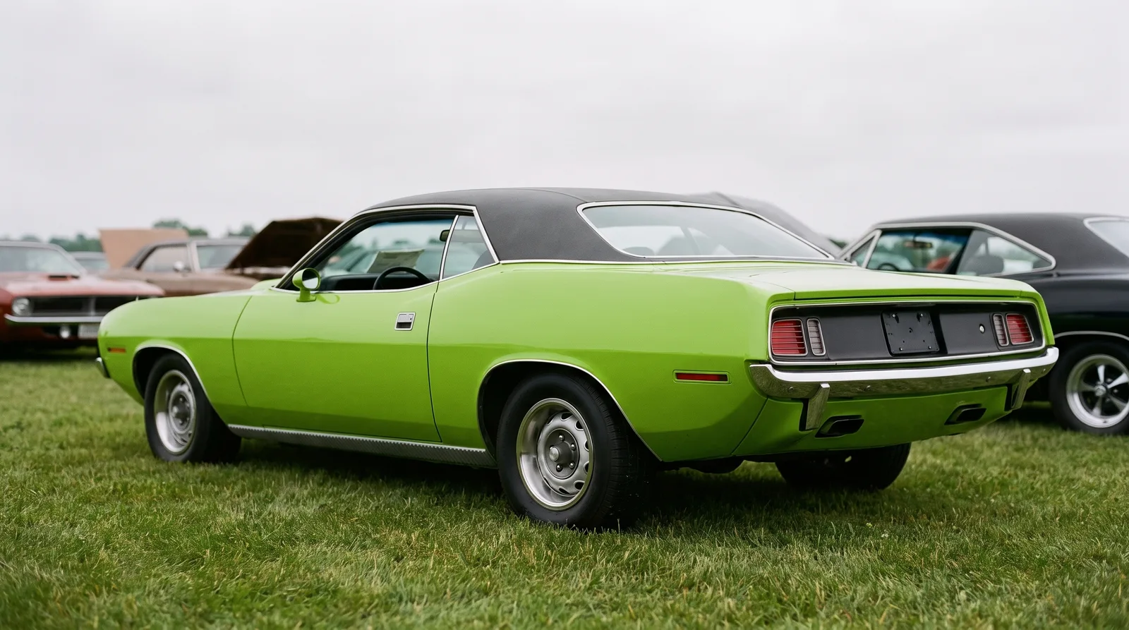 1970 Plymouth Hemi Cuda — Lime Light paint on a show lawn