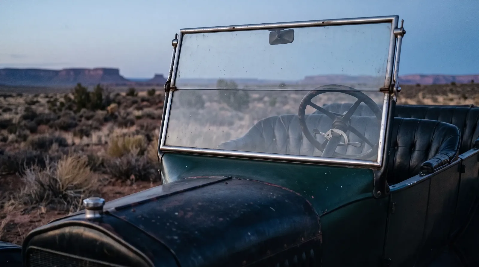 1927 Ford Model T, steering wheel and spark and throttle levers at dusk