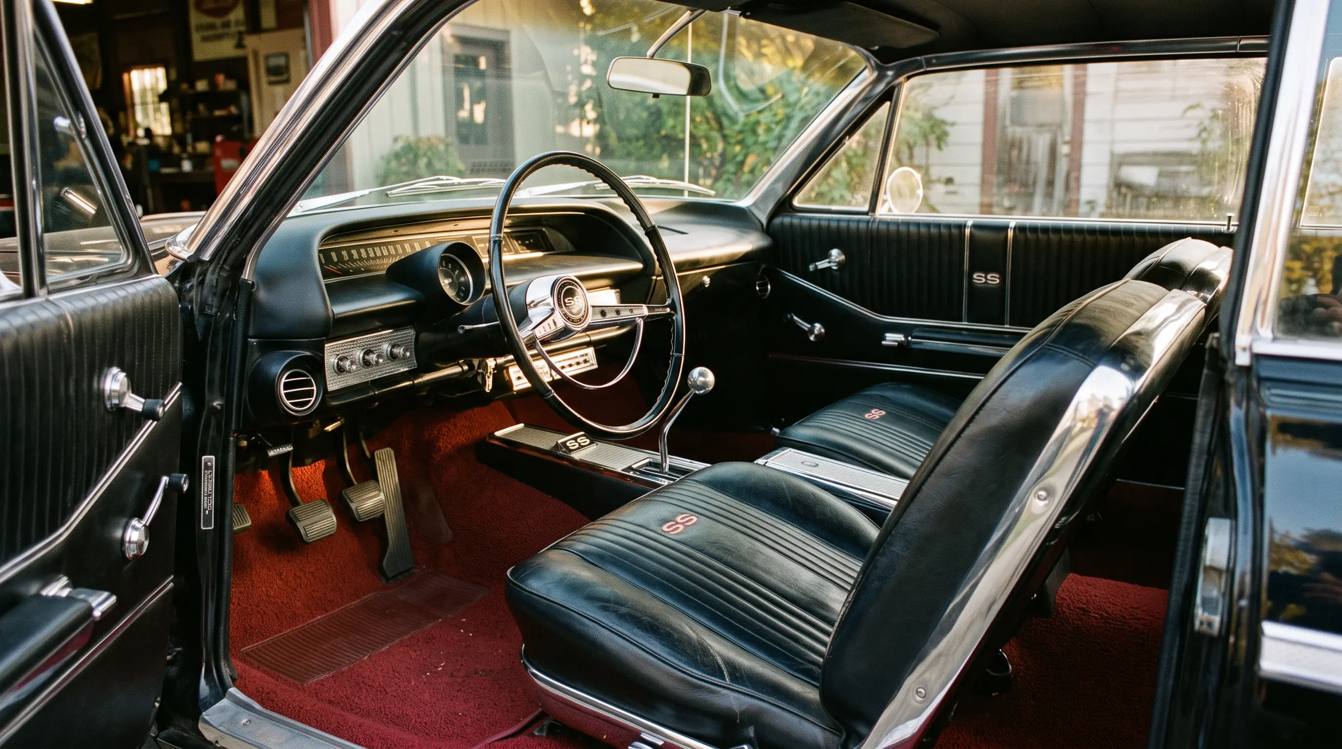 Interior of a 1964 Chevrolet Impala Super Sport with bucket seats and chrome trim