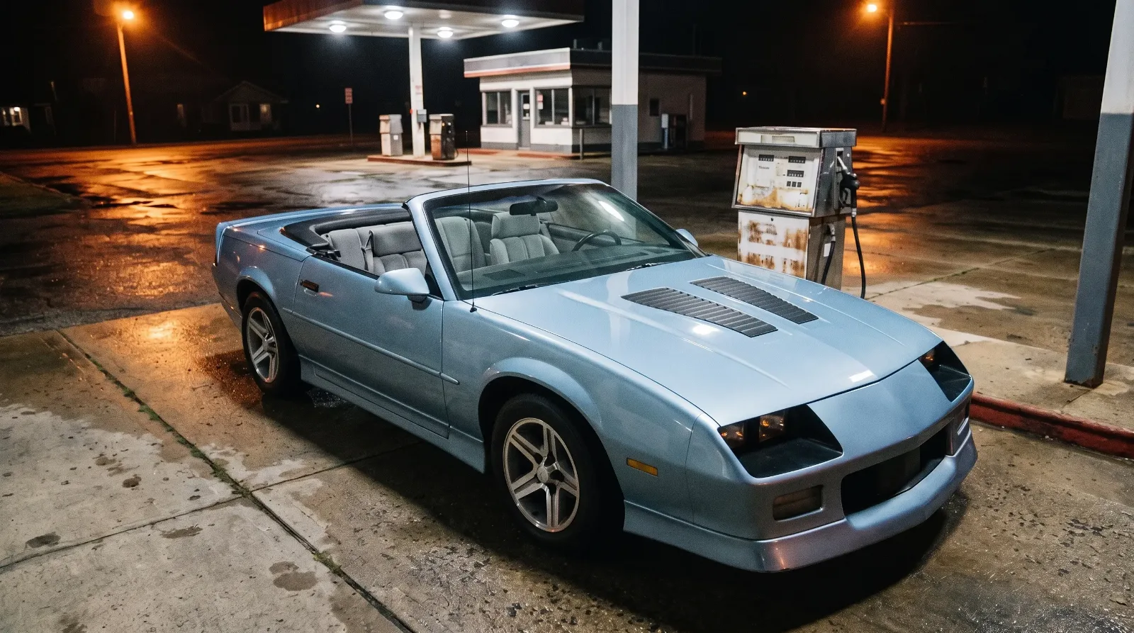 1989 Chevrolet Camaro IROC-Z convertible, at a gas station at night