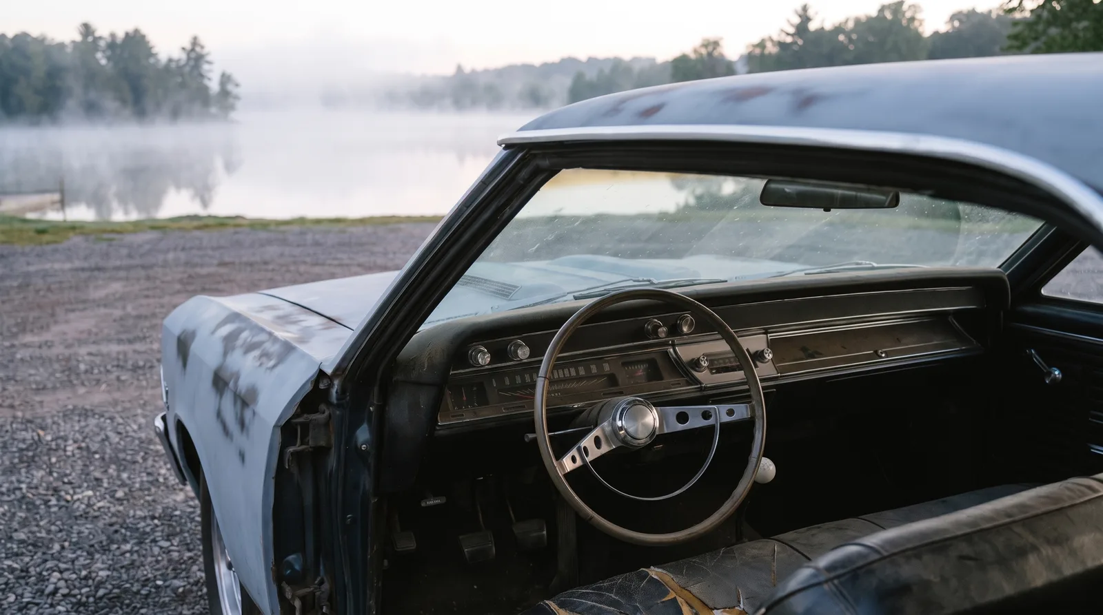 1966 Chevrolet Chevelle, primer project car interior by a misty lake