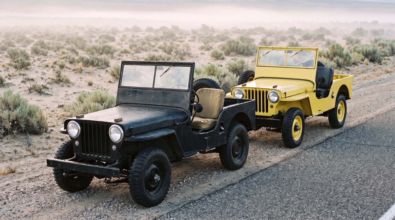 Early and late Willys CJ-2A, side by side on a desert highway