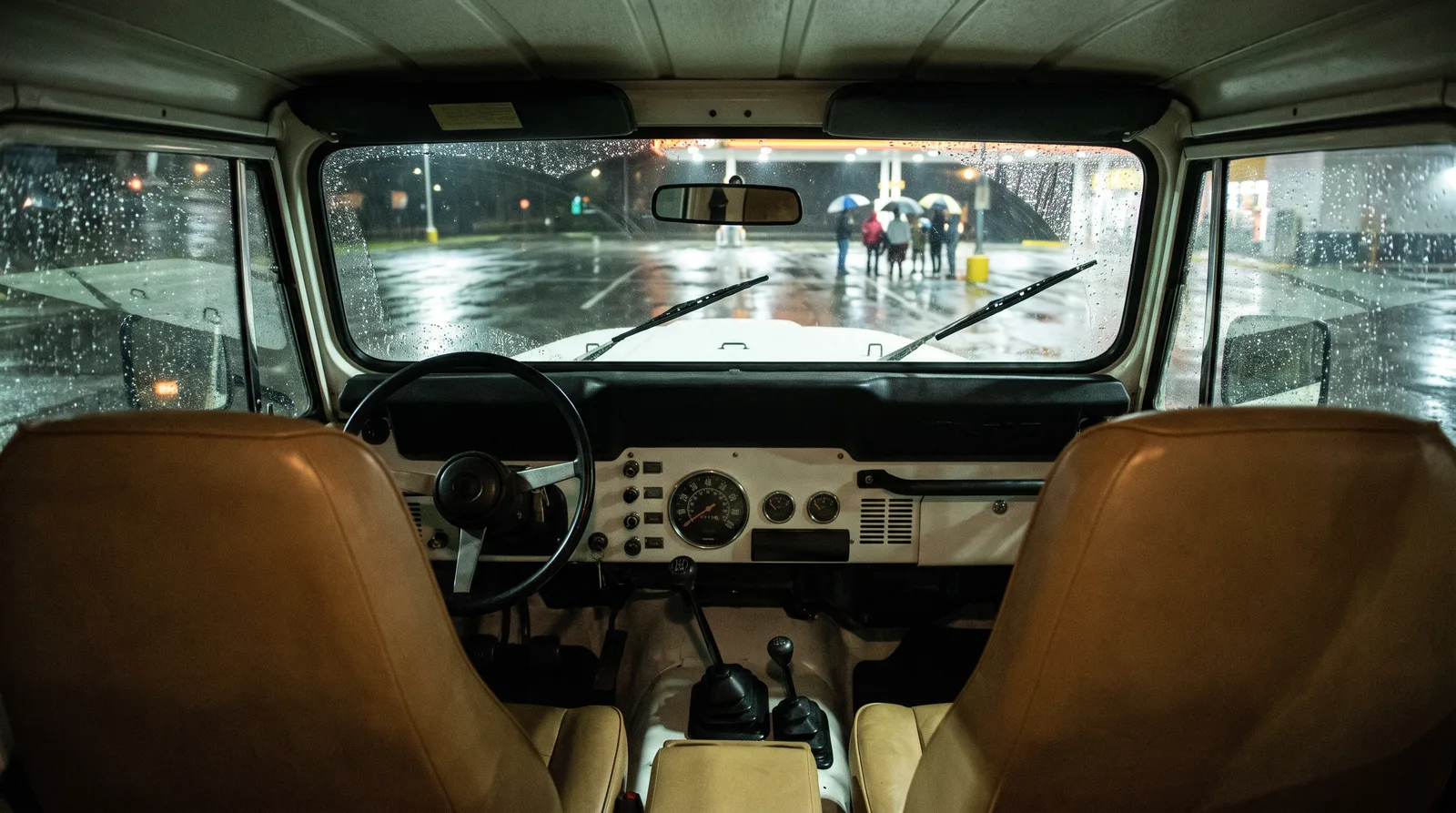 1981 Jeep CJ-7, interior view on a rainy night lot