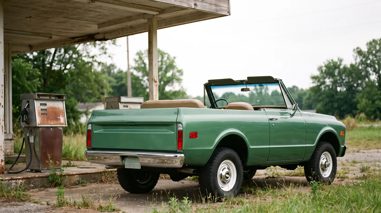 1969 Chevrolet K5 Blazer, top off at an old gas station