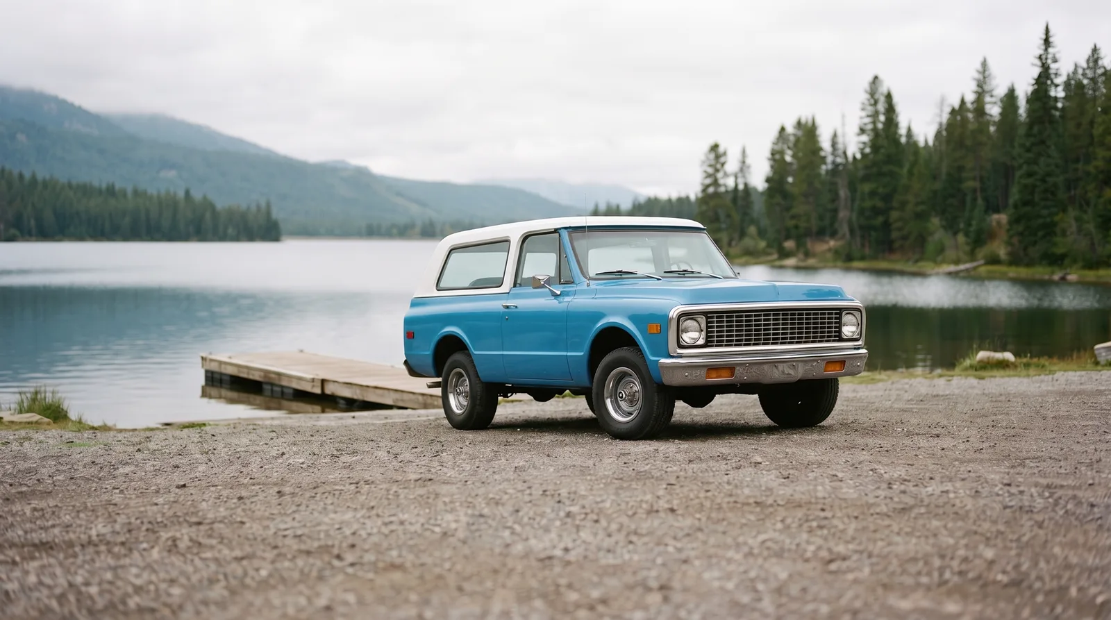 1972 Chevrolet K5 Blazer 4x4, parked on a lakeside gravel lot