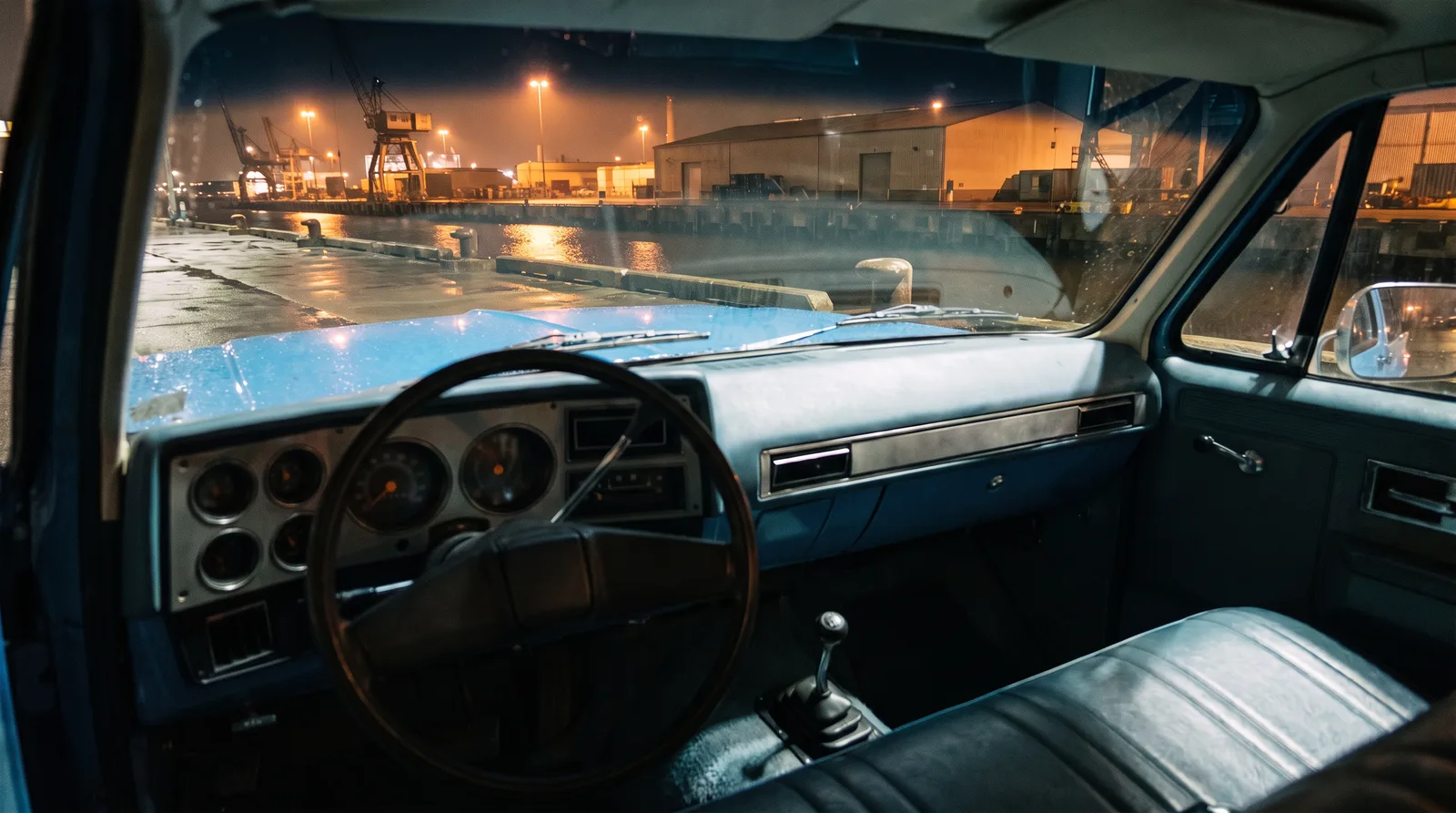 1973 Chevrolet K5 Blazer, dashboard view over a night waterfront