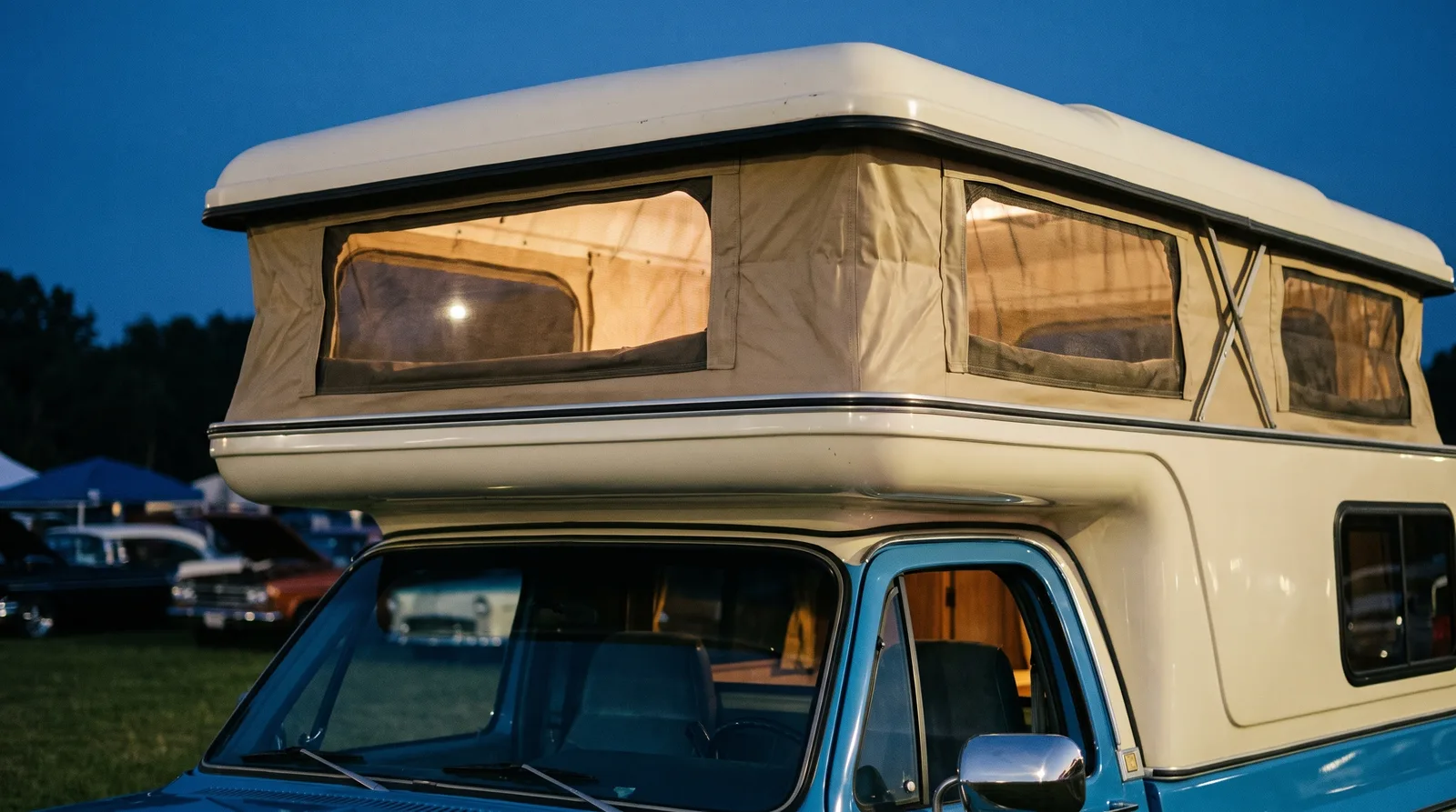 1976 Chevrolet K5 Blazer Chalet — pop-up camper roof at a car show