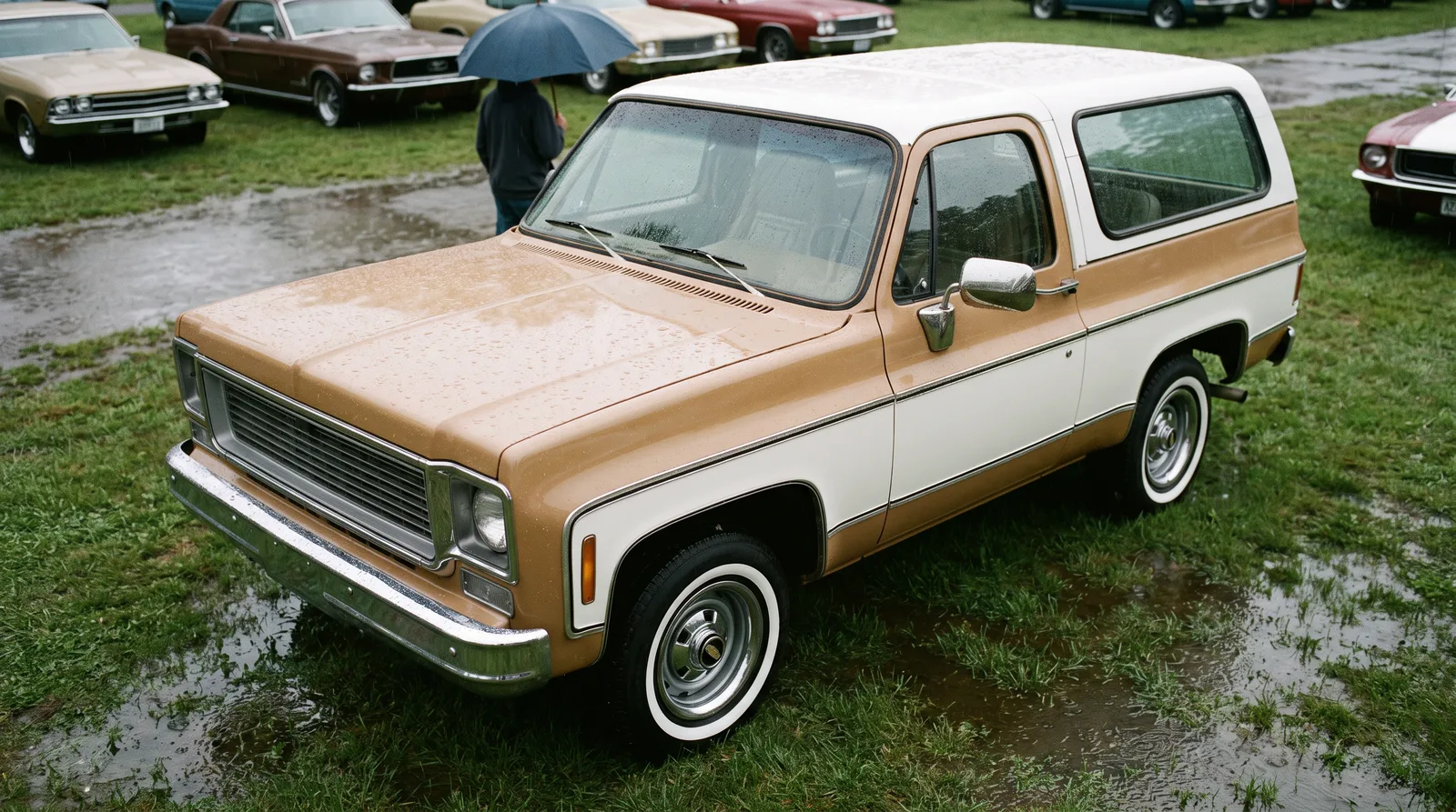 1979 Chevrolet K5 Blazer, tan and white squarebody at a rainy car show