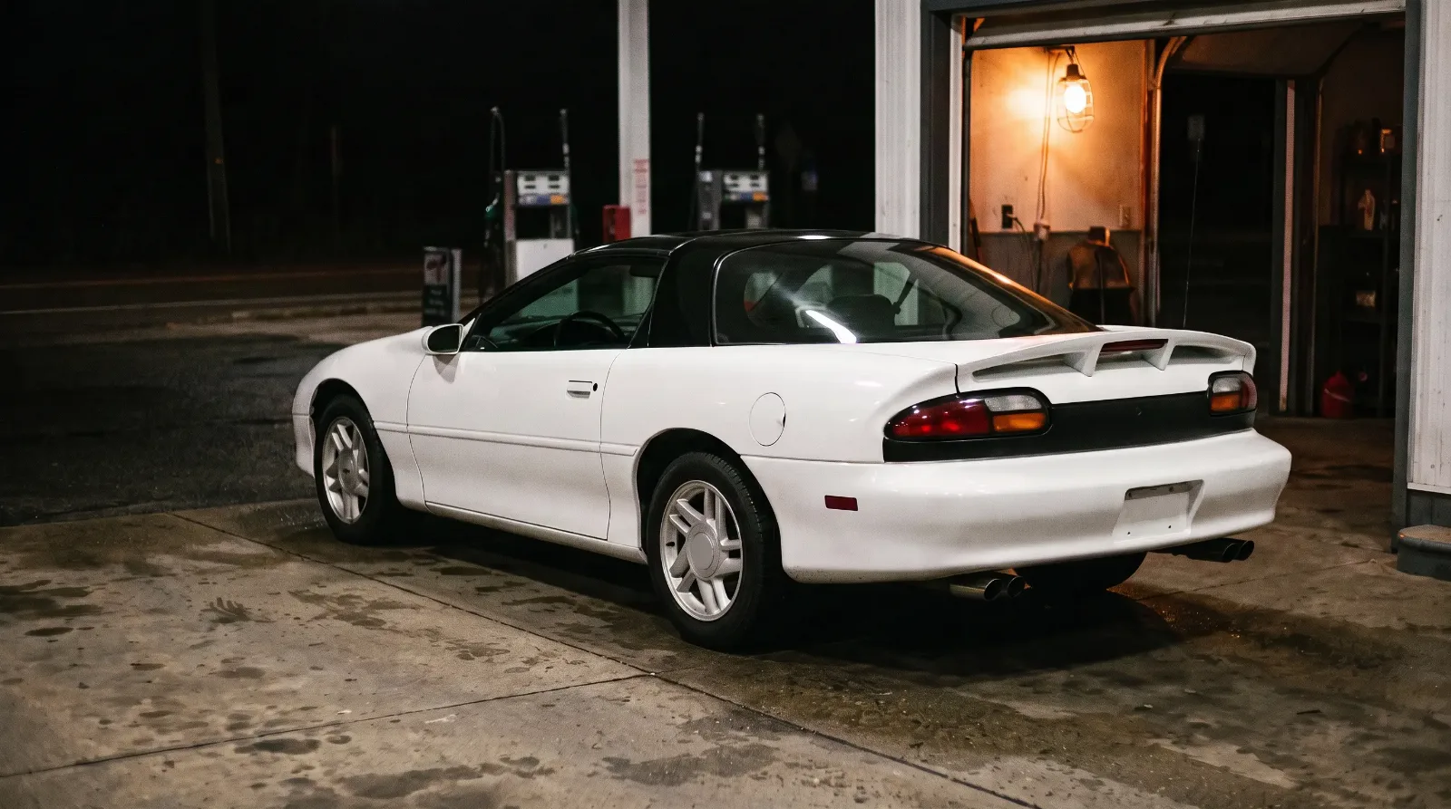 1995 Chevrolet Camaro Z28, at a gas station at night