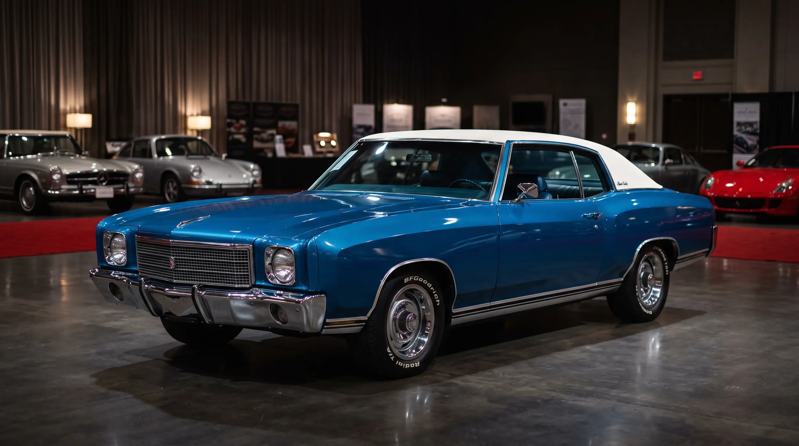 Blue first year 1970 Monte Carlo with white vinyl top at an auction preview