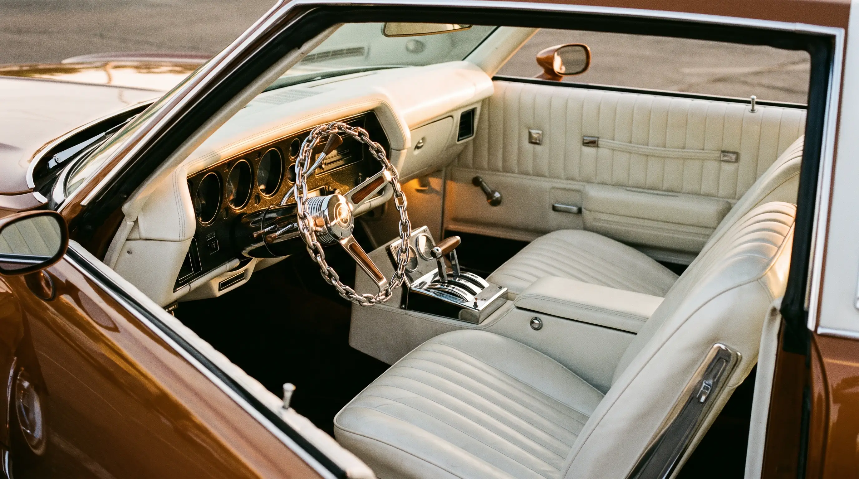 Tuck and roll white interior and hydraulic switches inside a Monte Carlo lowrider