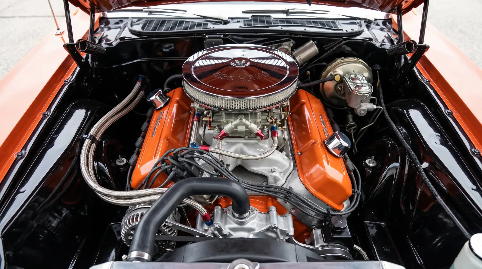 426 Hemi V8 with dual quads and orange valve covers in a classic Dodge engine bay