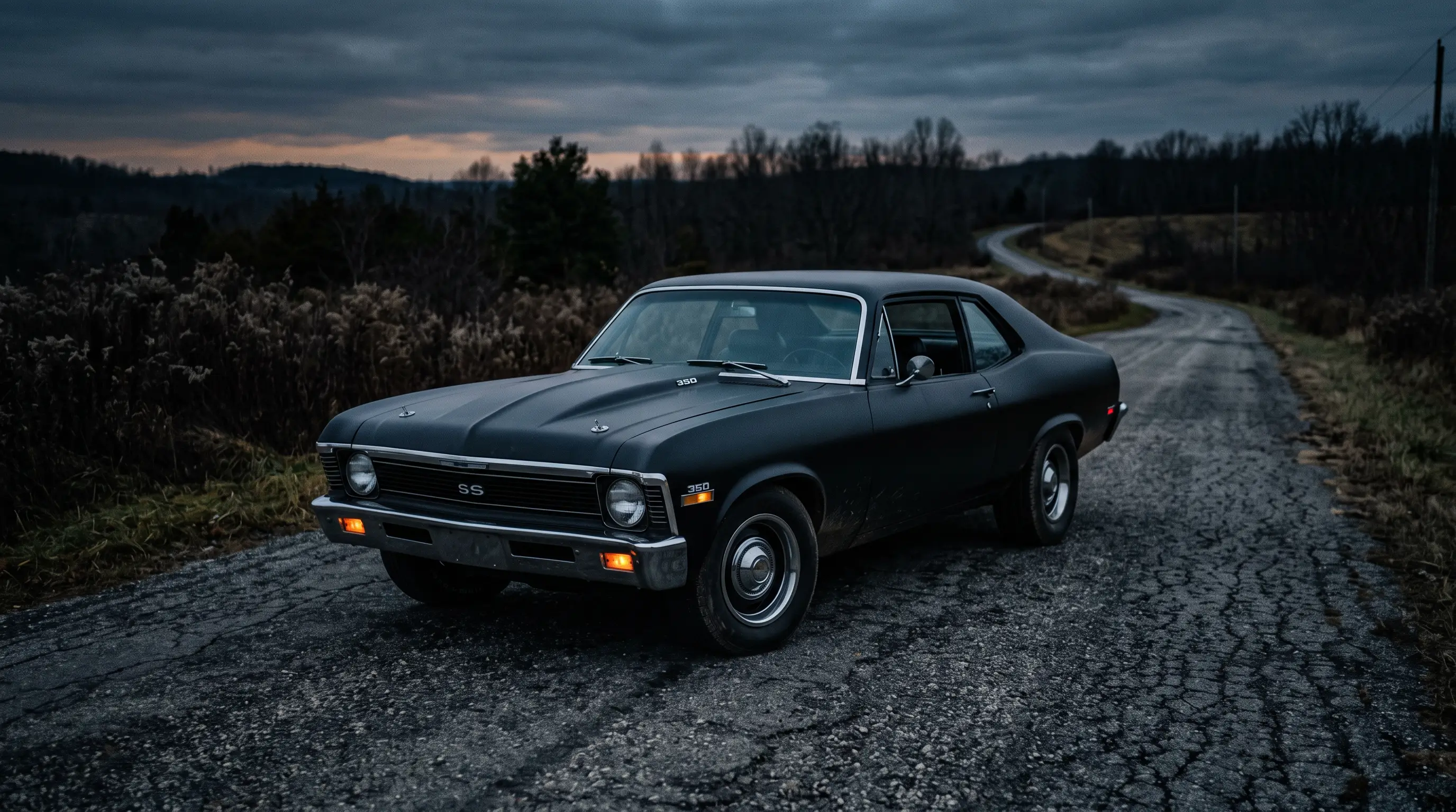Matte black 1971 Chevrolet Nova SS parked on a lonely road at dusk in moody light