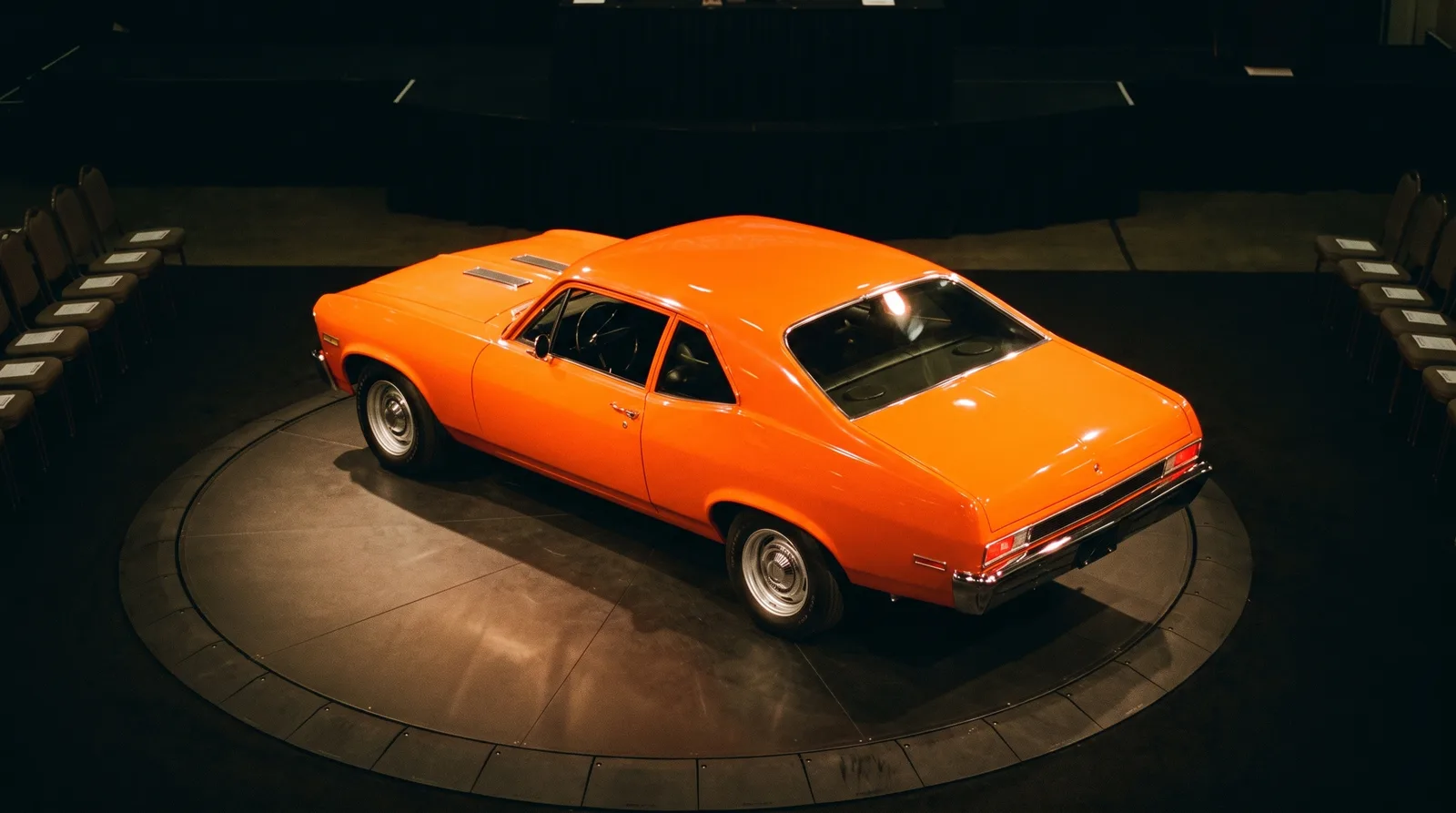 1969 Chevrolet Nova SS — on an auction turntable under spotlights