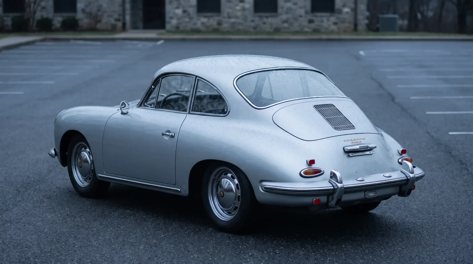 Rare 1962 Porsche 356 B T6 Karmann notchback coupe in metallic silver, three-quarter rear view showing the stepped roofline