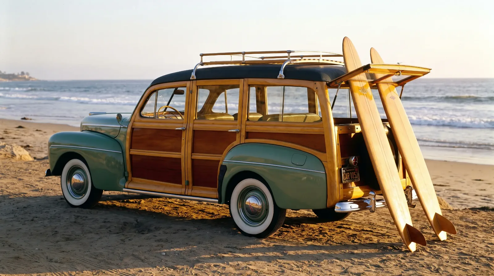 Late 1940s wood-bodied station wagon parked at the beach