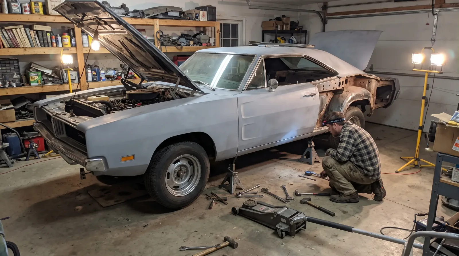 1969 Dodge Charger muscle car mid-restoration in a garage