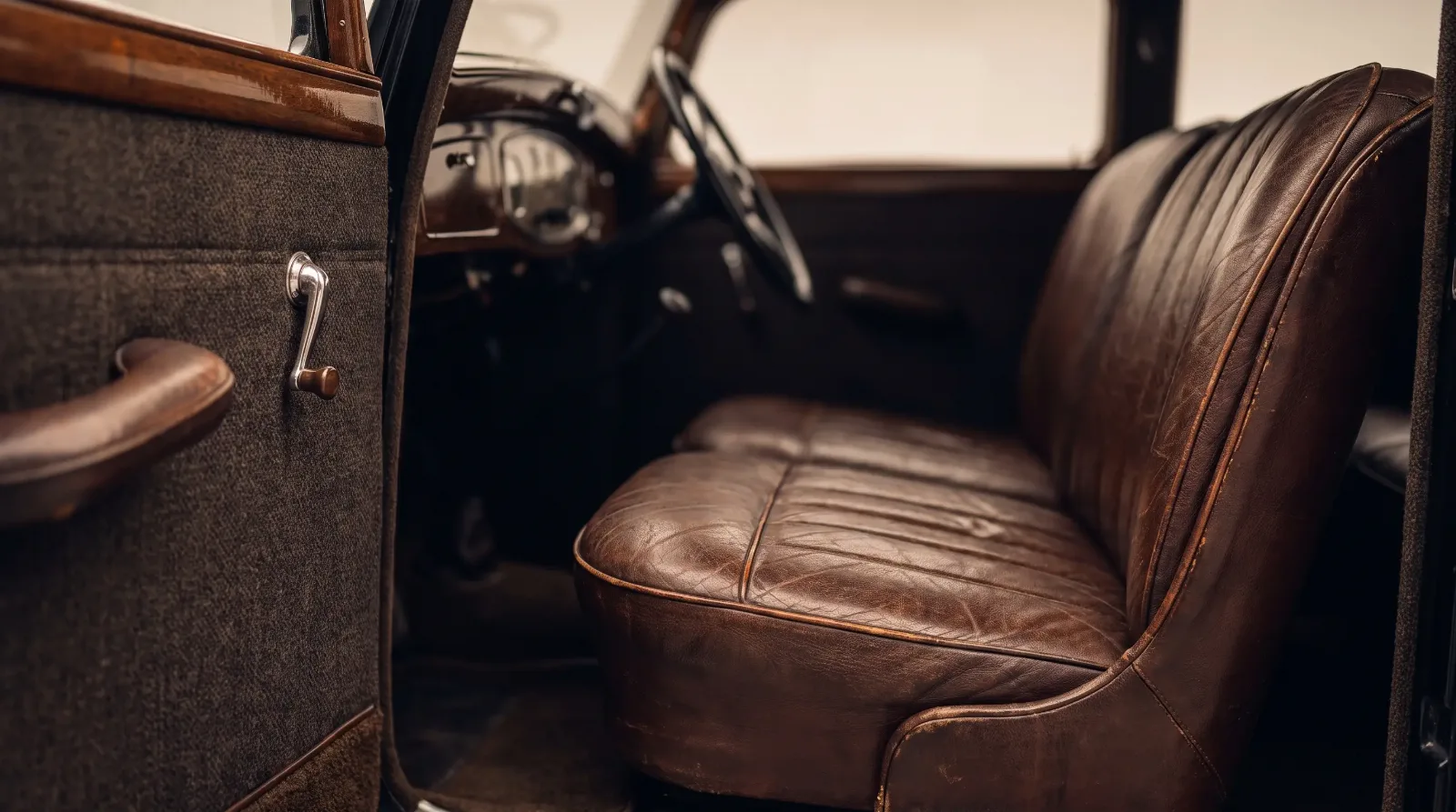 1930s interior - original leather seat and broadcloth detail
