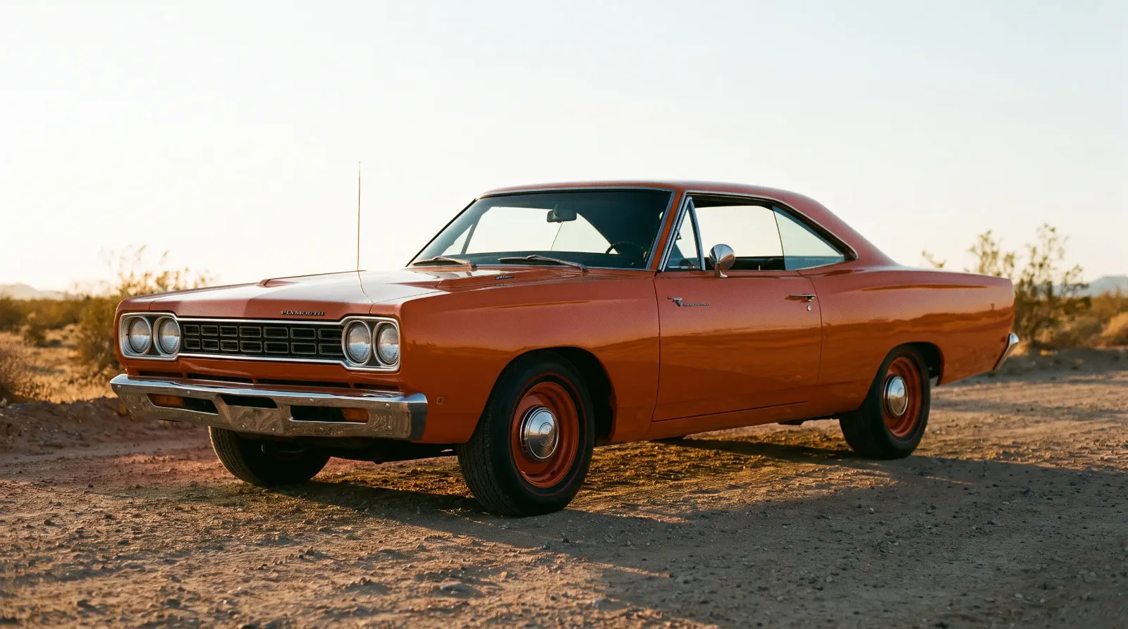 1968 Plymouth Road Runner in vibrant high-impact color, three-quarter front view