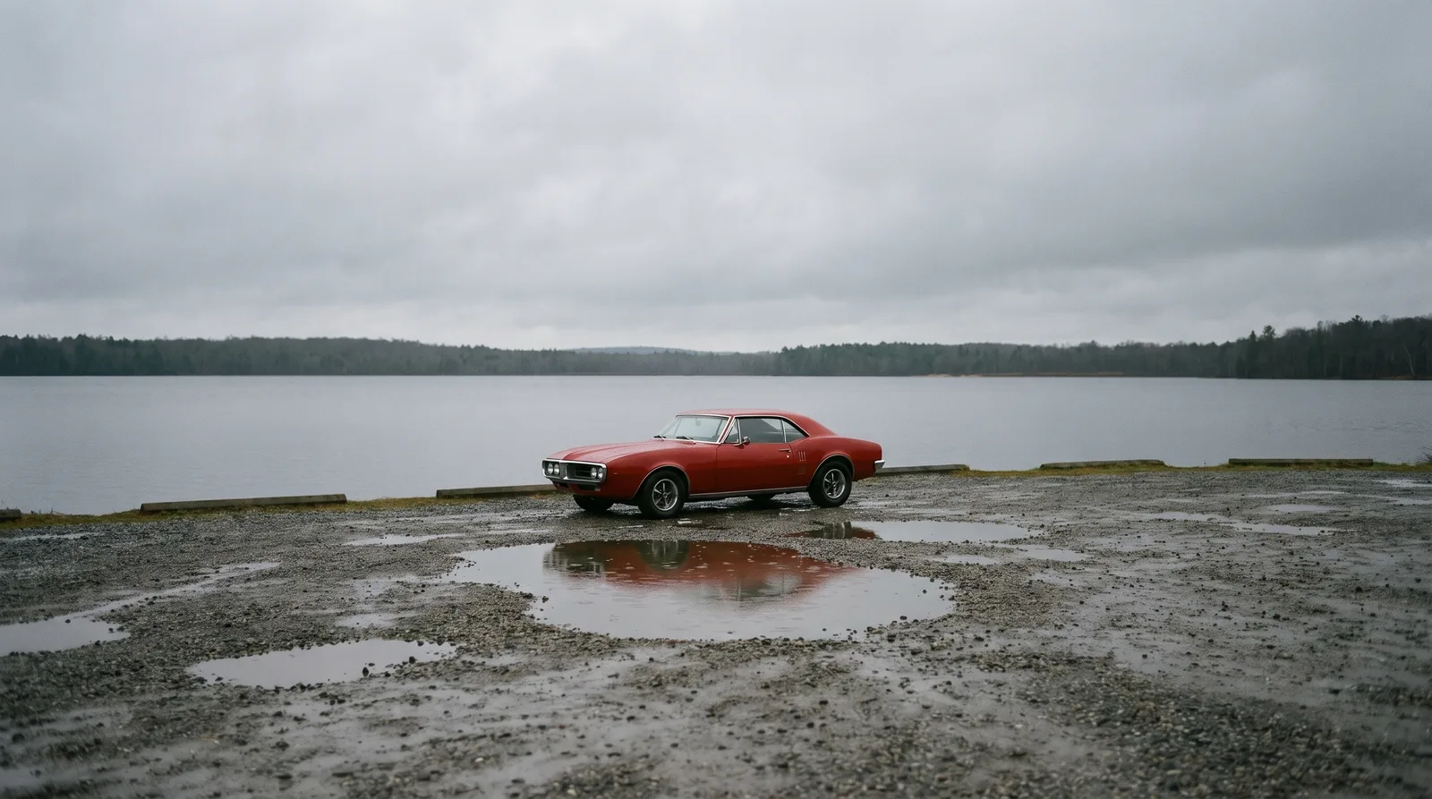 1967 Pontiac Firebird, waiting for a buyer at a lakeside lot