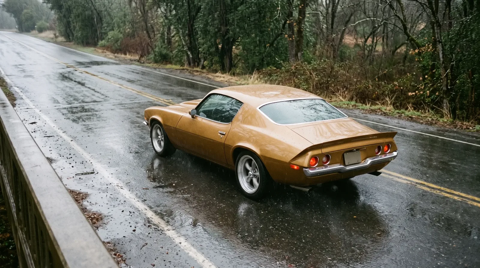 1972 Chevrolet Camaro, split-bumper coupe on wet road
