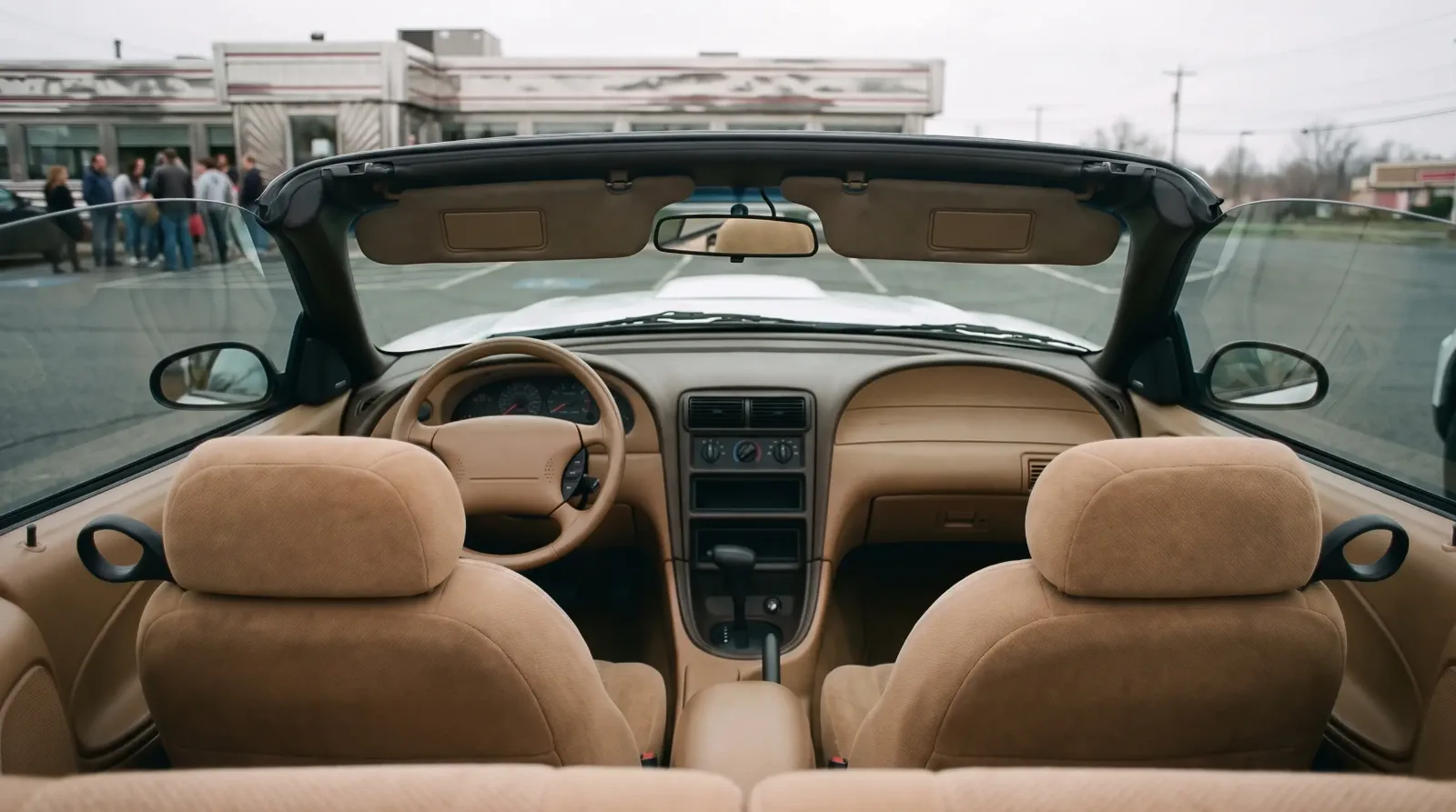 1994 Ford Mustang GT convertible, dash view at a diner